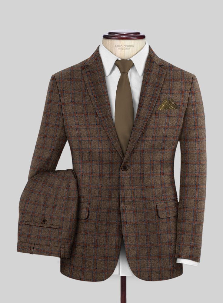 Fashion-forward and exceptionally smart, our Italian Iana Brown Wool Suit will add a touch of contemporary class to your wardrobe. Made from super 120s merino wool, it seamlessly combines style, comfort, and performance in perfect harmony. The deep Iana brown color, enriched with an overcheck pattern, creates beautiful details that work well for both formal office wear and pared-back weekend looks. 
 
Look features a 2 button jacket with notch lapels, h orn b  rown    buttons, single vent, two c Brown Wool Suit, Formal Office Wear, Formal Office, Button Jacket, Perfect Harmony, Wool Suit, Jacket Buttons, The Deep, Office Wear