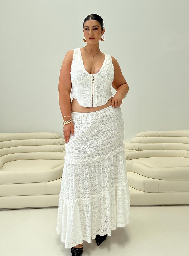 Princess Polly Curve Lace maxi skirt Elasticated waist, lace material, layered frill detail Good stretch, fully lined Main: 90% nylon 10% elastane, Lining: 100% cotton Cold hand wash