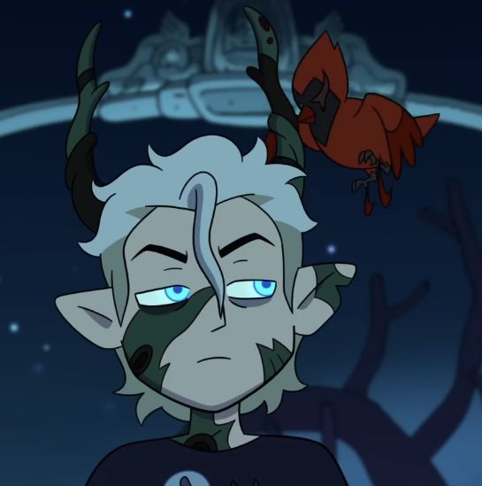 an animated character with horns and blue eyes in front of a dark background, looking at the viewer