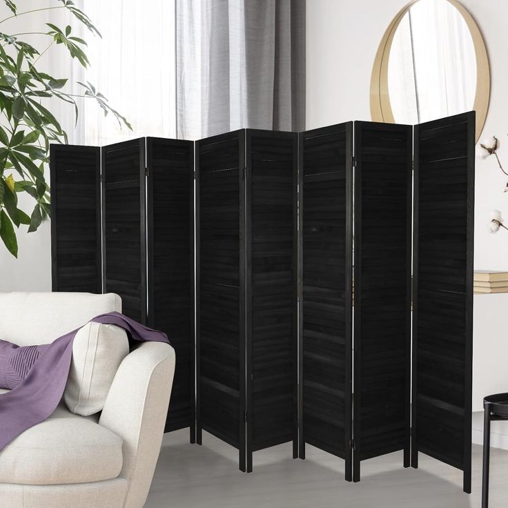 the room divider is black and white in color