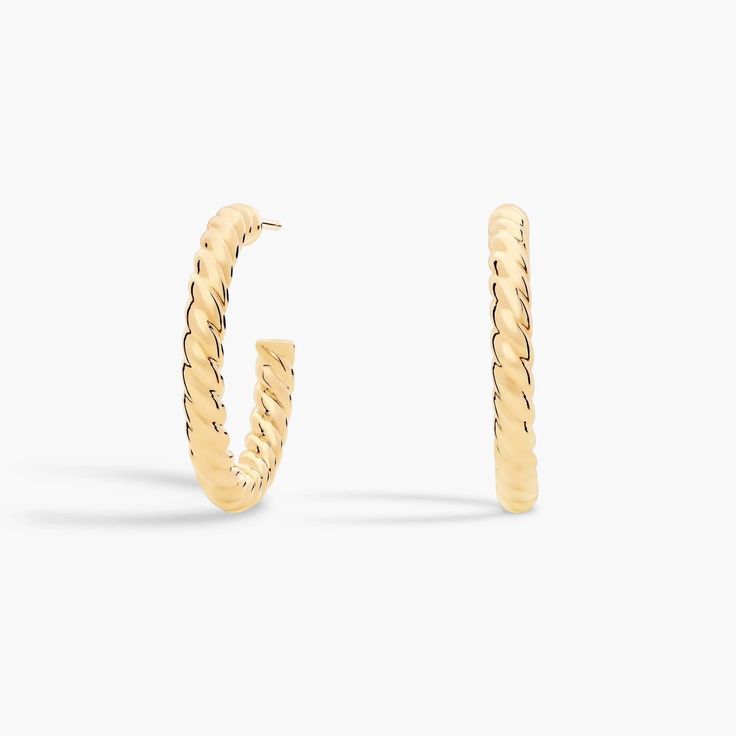 Go for luxurious style with these bold hoop earrings featuring gleaming 14k yellow gold design. The thicker style features twisted texture to give them a classic rope-inspired look. Blue Nile, Metal Earrings, Gold Design, Hoop Earrings, Jewelry Earrings, Yellow Gold, Texture, Yellow, Gold