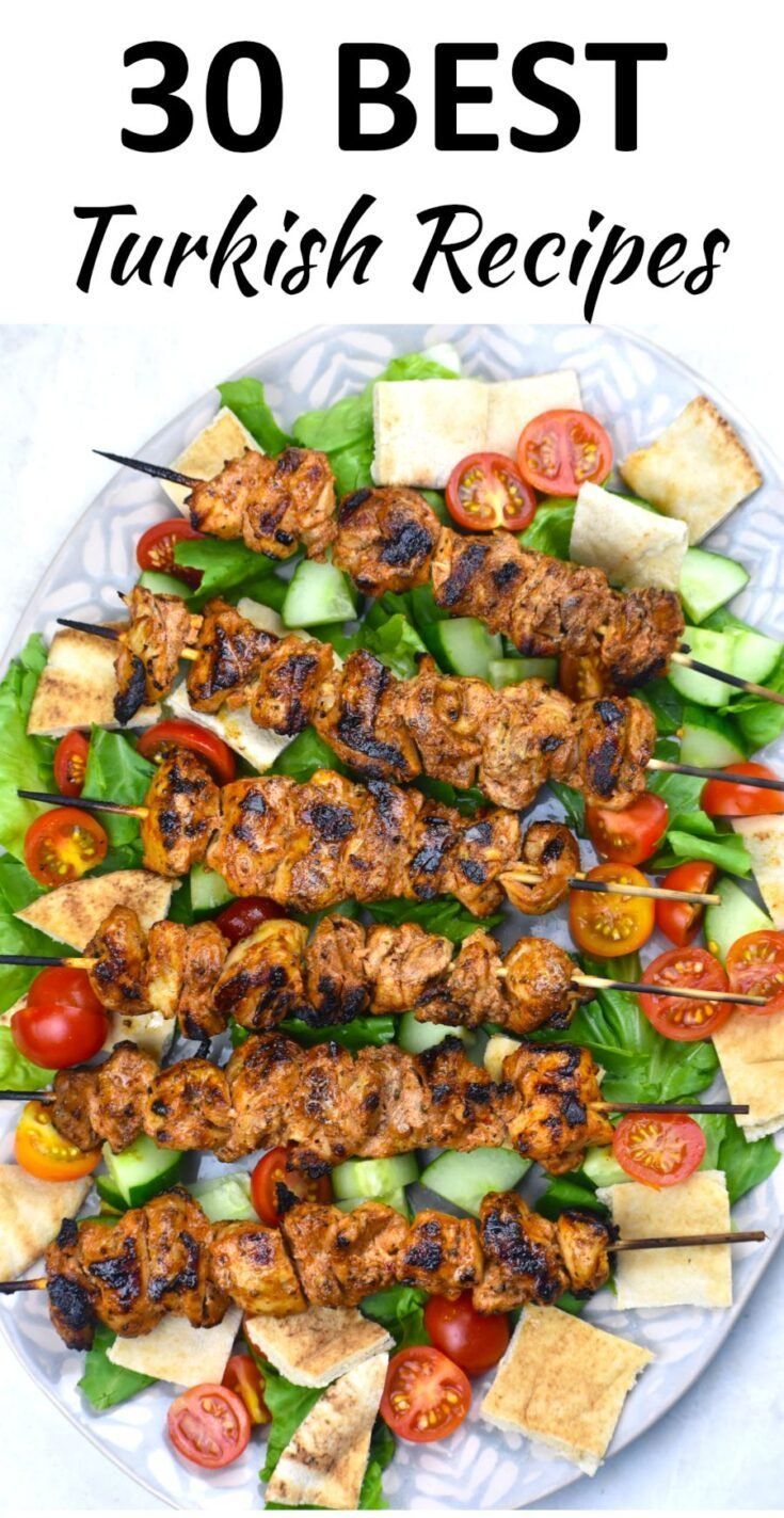 the best turkish food is served on skewers with tomatoes, cucumbers and lettuce