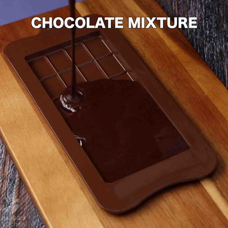 chocolate mixture being poured into a square tray