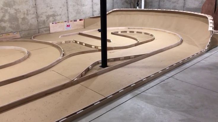 a skateboard park with ramps in the middle