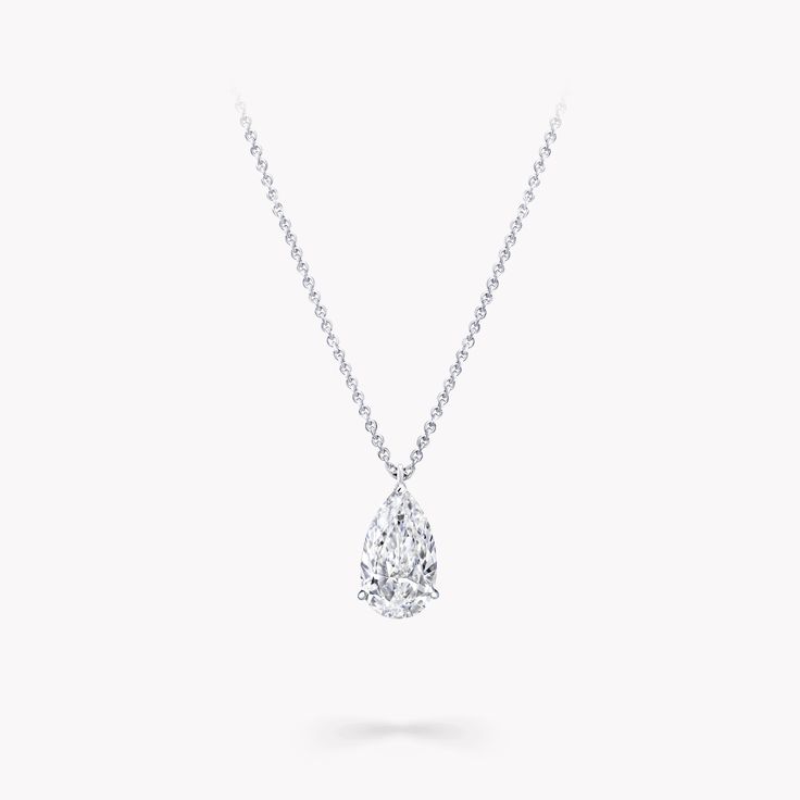 Endlessly elegant, our pear shape diamond pendants are especially alluring, with their streamlined silhouette complemented by a delicate platinum chain that allows the stone to take centre stage. Available in a range of carat weights, each Classic Graff piece is hand-crafted in our London workshop, with every stone individually set to ensure that its natural radiance and fire can powerfully emanate. Graff Jewelry, Graff Diamonds, Diamond Solitaire Pendant, Platinum Chain, Diamond Earrings Studs Round, Platinum Jewelry, Colorless Diamond, Round Diamond Engagement Rings, Solitaire Pendant