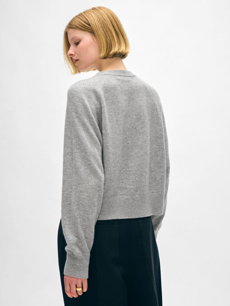 The sweatshirt you know and love returns, and now with more modern appeal. Updated with a cropped length, this relaxed-fitting style is crafted from our classic cashmere weight with sporty raglan sleeves and ribbed trims. Pair it with the matching jogger for a luxe loungewear look, or wear it with jeans for days on the go. Details Relaxed fit. Long sleeve. Length in size small is 21". The model is 5'11" and is wearing a size small. 100% Cashmere. Hand wash cold or dry clean. Do not twist or wrin Casual Cashmere Cropped Sweater For Layering, Fall Cropped Sweatshirt With Ribbed Cuffs, Everyday Fall Sweater With Ribbed Waistband, Boxy Fit Cropped Sweater With Ribbed Cuffs For Fall, Cashmere Tops With Ribbed Cuffs For Loungewear, Sporty Boxy Fit Cropped Sweater For Fall, Casual Cashmere Crew Neck Cropped Sweater, Winter Cropped Sweatshirt With Ribbed Cuffs, Modern Fall Sweatshirt For Loungewear