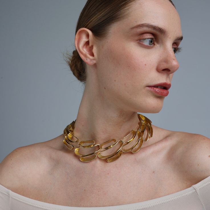 Choker Brass Hypoallergenic, nickel-free, and long-lasting in wear With an exquisite blend of fashion-forward design and timeless technique, our artisans have been meticulously crafting handmade brass jewelry since 1987. When you choose our pieces, you are investing in passion and skill that shines through in every detail. Contemporary Yellow Gold Jewelry For Wedding, Contemporary Yellow Gold Wedding Jewelry, Formal Matte Gold Metal Jewelry, Modern Yellow Gold Brass Jewelry, Wedding Jewelry With Polished Metal Finish, Polished Metal Wedding Jewelry, Formal Gold Hammered Jewelry, Modern Gold-tone Jewelry For Wedding, Formal Gold-tone Hammered Jewelry