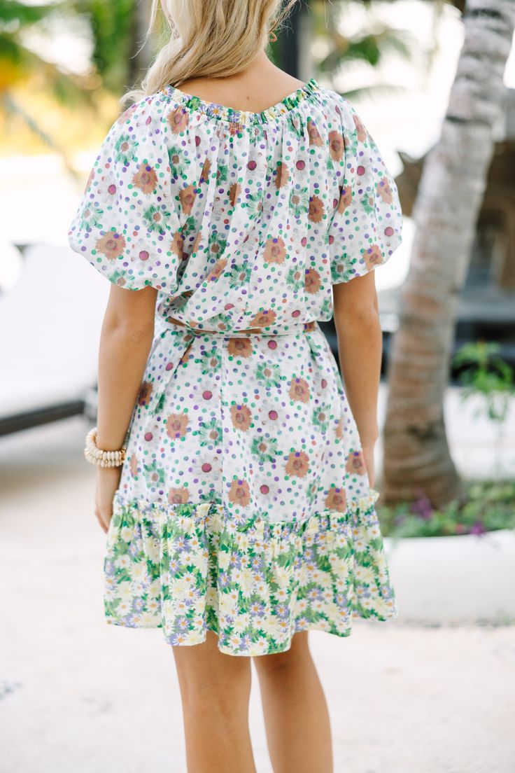 This floral dress is so cute and easy to wear! It's the perfect combination of classy and casual. Which means you can dress this beauty up with heels or down with sandals. Round neckline Short sleeves Tied waist Dual floral print No stretch Poppy is wearing the small. Chic Floral Print Dress For Day Out, Summer Floral Print Mini Dress For Brunch, Vacation Dresses With Tie Waist For Spring, Summer Dress With Tie Waist For Garden Party, Chic Floral Print Mini Dress For Vacation, Spring Summer Dress With Tie Waist, Spring Dress With Tie Waist, Summer Tropical Print Floral Dress For Garden Party, Summer Floral Dress With Tropical Print For Garden Party