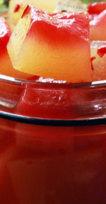 some fruit is sitting in a bowl on the table