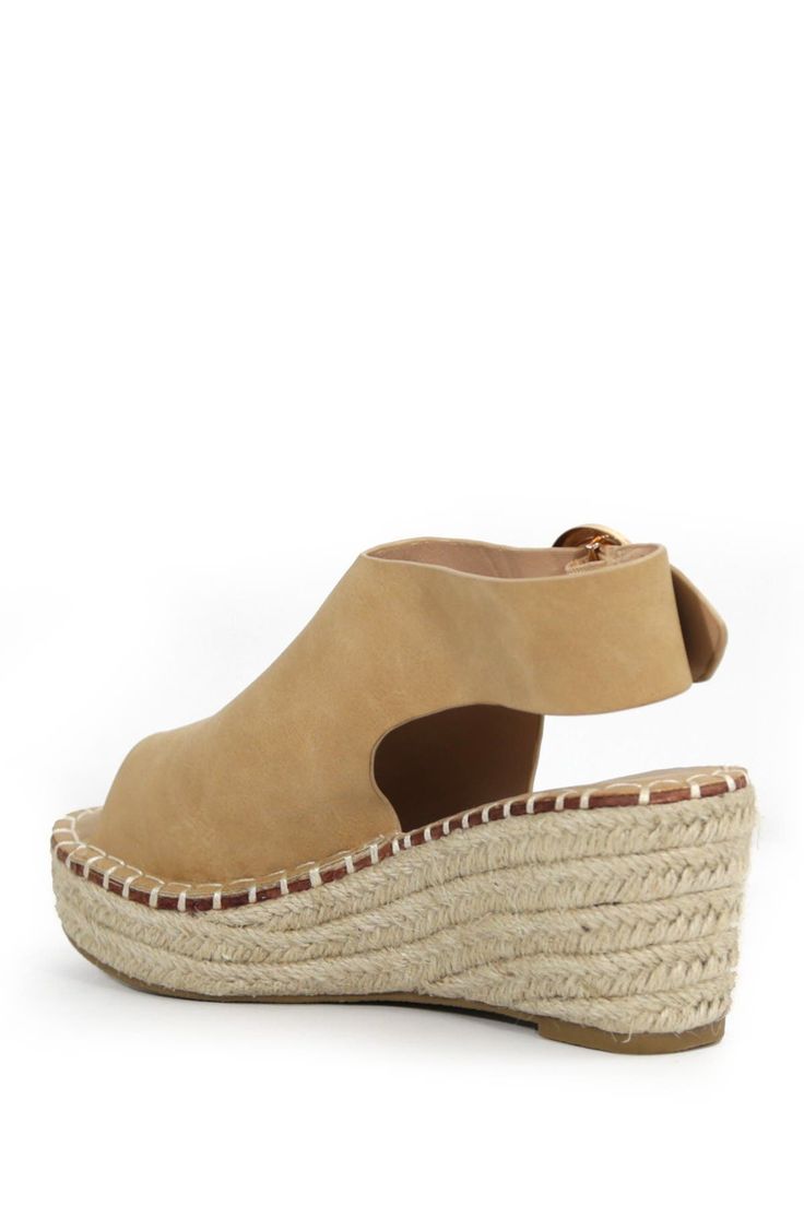 A woven espadrille wedge heel brings summery vibes to this chic sandal, finished with a peep toe and buckle strap closure. Sizing: True to size. 2.5" heel, 2" platform Espadrille wedge heel PU upper, manmade sole Imported This item cannot be shipped to Canada. Summer Platform Slingback Wedge Sandals, Vacation Slingback Sandals With Platform And Open Heel, Vacation Platform Slingback Sandals With Open Toe, Beige Wedge Heel Slingback Sandals For Spring, Spring Platform Slingback Sandals With Wedge Heel, Spring Adjustable Wedge Sandals With Block Heel, Casual Slingback Wedge Heel Sandals For Vacation, Spring Adjustable Block Heel Wedge Sandals, Spring And Summer Style Open Toe Wedge Sandals