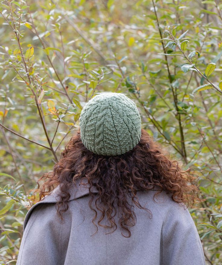 This handsome gansey style unisex cap sports bold rope cables and delicate seeded tree forms sprouting from a brim of half-twisted rib, which can be worked to shorter or longer lengths to achieve your desired fit.Designed for DK- and chunky-weight gauges, this hat shines in both woolen- and worsted-spun yarns. Designer: Jared Flood Collections: Ganseys; Arbor Launch; BT Essentials Bundle & Save We hand-selected some of our all-time favorite hat patterns by Jared from the BT archives and are happ Cable Cast On, Style Beanie, Brooklyn Tweed, Cap Patterns, Double Pointed Needles, Hat Patterns, Knit In The Round, Hat Pattern, Wool Yarn