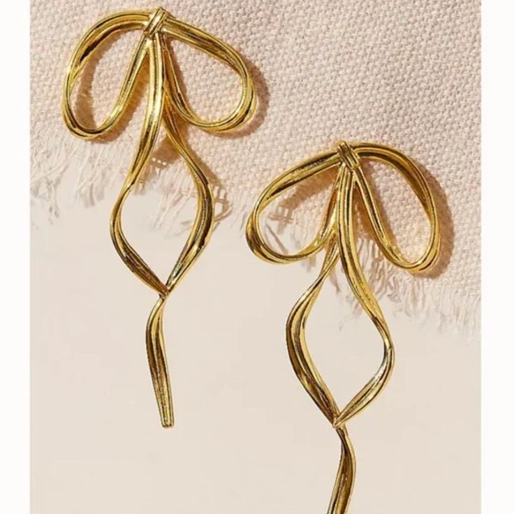 3” Long Gold Tone Post Earrings Nwot Same Day / Next Day Shipping 5 Seller Fp Earrings Jewelry Ribbon Bow Silver Gold Boho Tie Knot Statement Wedding Guest Black Tie Event Vacation Classic Trendy Chic Wedding Guest Black Tie, Trendy Chic, Black Tie Event, Bow Earrings, Tie Knots, Ribbon Bow, Ribbon Bows, Earrings Jewelry, Black Tie