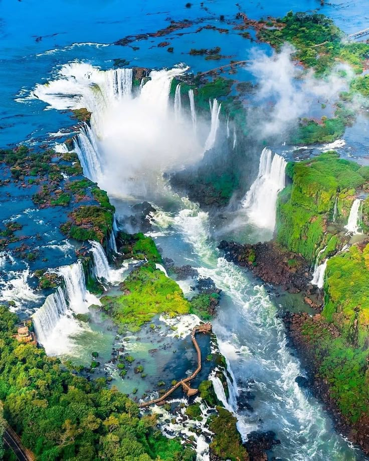 an aerial view of the waterfalls and river