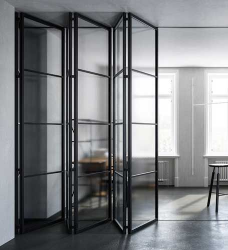 an empty room with glass partitions in it