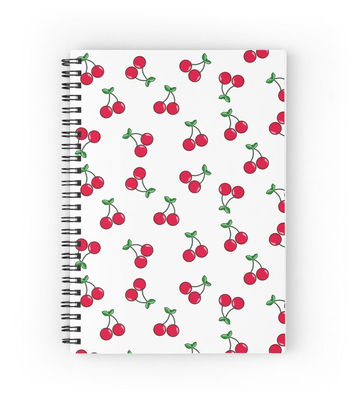 a spiral notebook with cherries on it