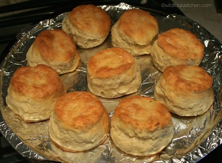 a bunch of biscuits sitting on top of tin foil