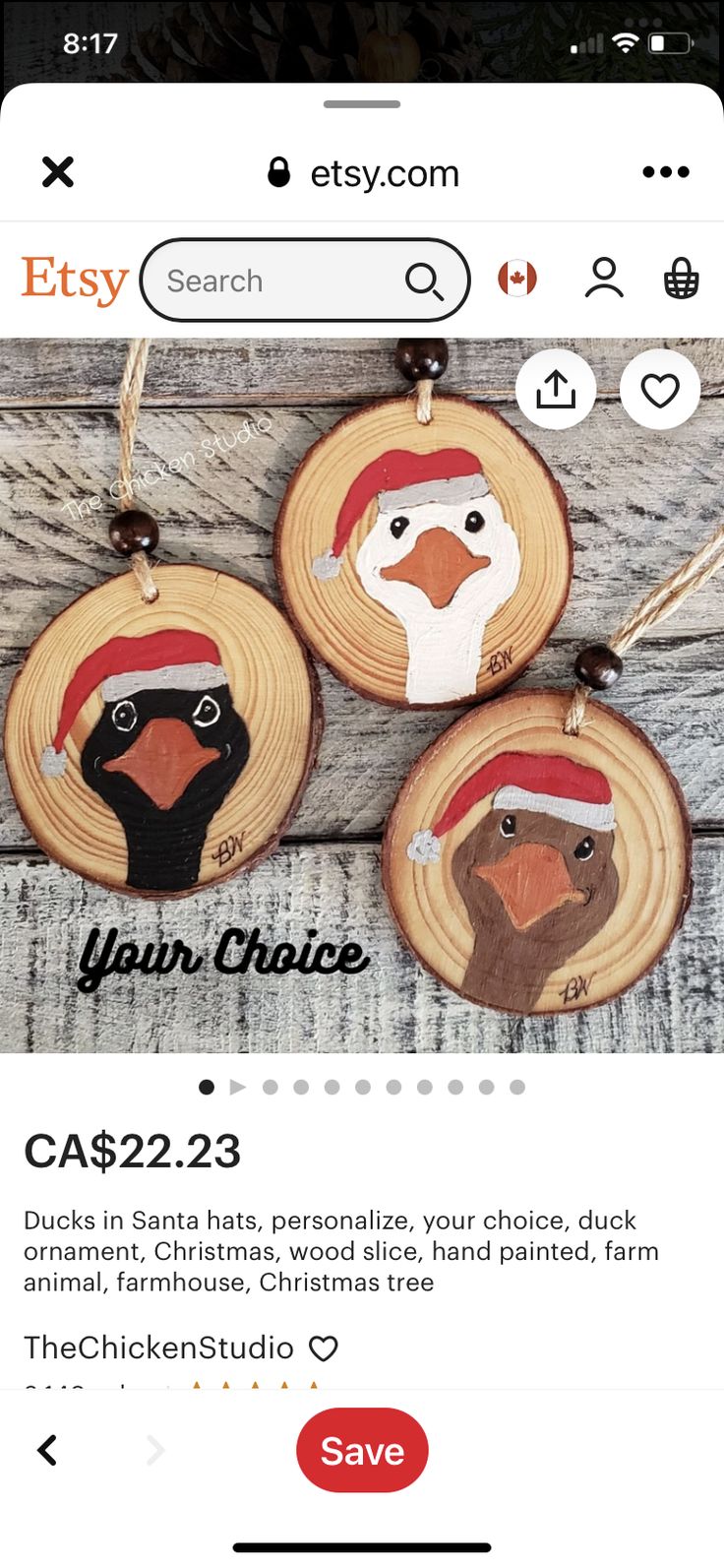 three wooden christmas ornaments with santa hats, one penguin and the other bird on them