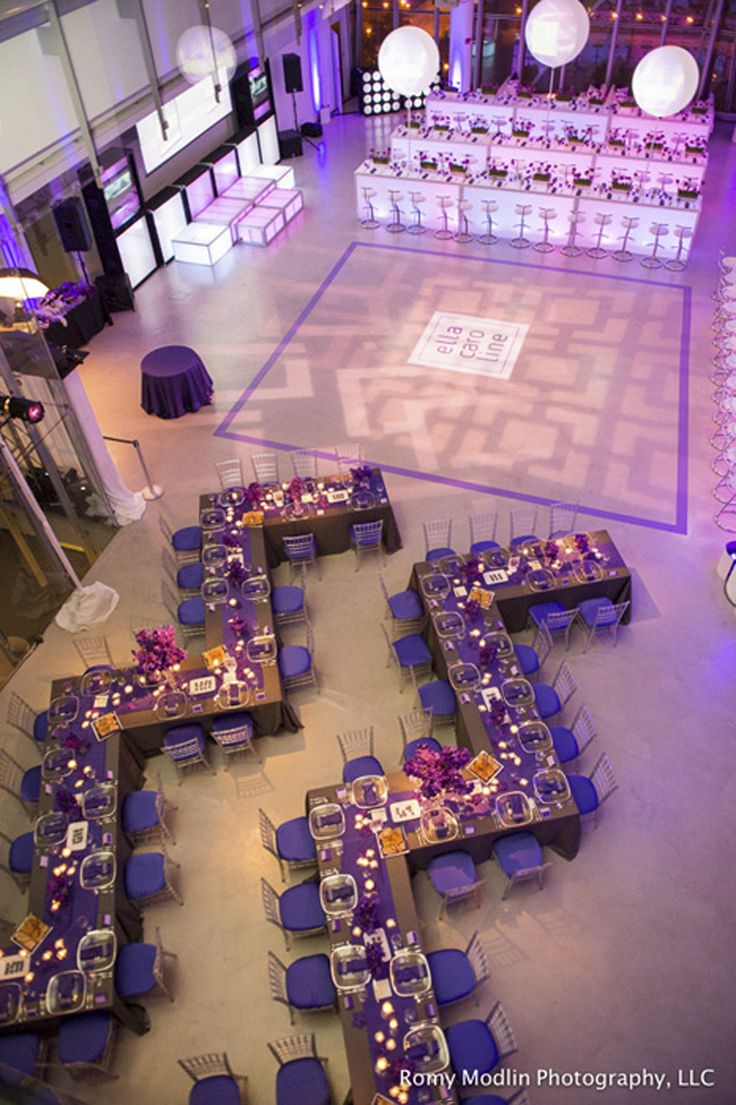 an overhead view of a banquet hall with tables and chairs set up in the center