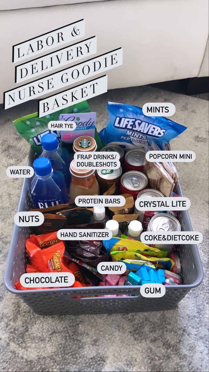 a plastic container filled with lots of different types of food and drinks on top of a table