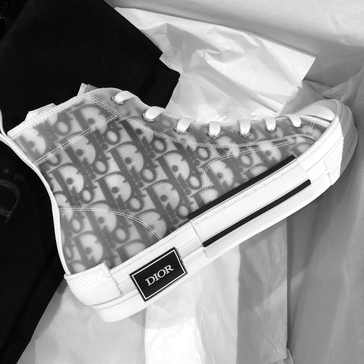 Dior B23 Oblique High Top Sneakers by Kim Jones. All items are brand new & 100% authentic. DETAILSWhite lacesWhite technical canvas liningWhite calfskin pull tabTwo-tone white and black rubber sole, textured "Dior" logo Can't find your size? Use our Sourcery service or speak to a member of our team via WhatsApp Pretty Sneakers, Kim Jones, Dior Logo, Mens Travel Bag, Fashion Buyer, Homewares Shop, Trending Sneakers, Swag Shoes, Bag Trends