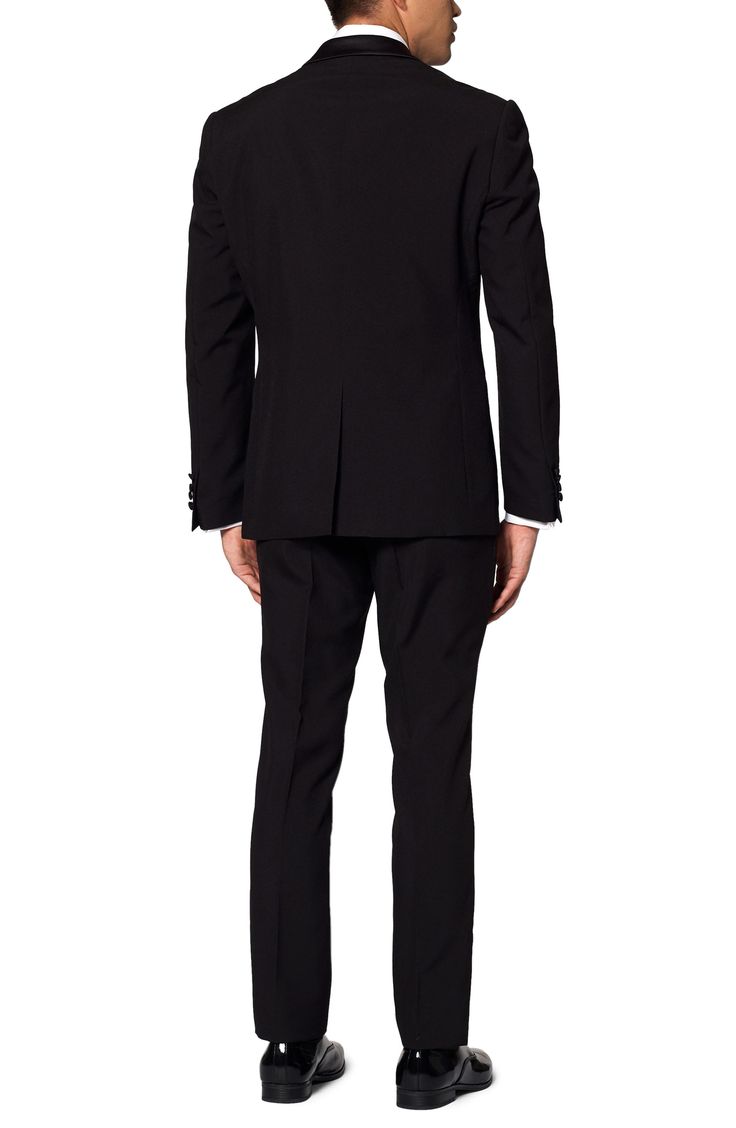 A classic look brings entrance-making distinction to a tuxedo that keeps you crisp and smart in a jacket, pants and matching bow tie. Includes suit jacket, pants and bow tie Jacket has shawl collar; three-button cuffs; chest and front welt pockets; four interior pckets Partially lined 100% polyester Machine wash, line dry Imported Fitted Evening Suit With Notch Lapel, Fitted Blazer For Black-tie Events, Classic Fitted Blazer For Black-tie Events, Elegant Slim Fit Single Button Tuxedo, Timeless Fitted Tuxedo With Pressed Crease, Fitted Tuxedo Suit For Black-tie Events, Black-tie Tuxedo Blazer In Slim Fit, Classic Notch Lapel Tuxedo For Black-tie Events, Fitted Tuxedo For Black-tie Events