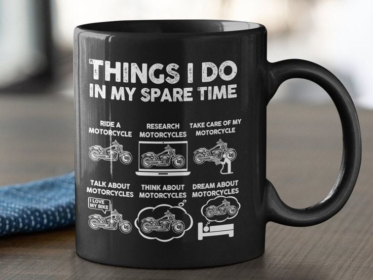 a black coffee mug with things i do in my spare time written on the side