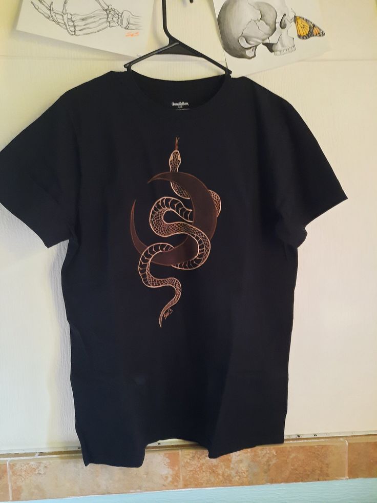 This is a hand painted bleached shirt, sized large. It took 5+ hours as every scale is painted individually (2nd photo as a close up). 100% Cotton, Goodfellow brand shirt. Machine wash friendly (it won't bleach your other clothes!) Black T Shirt Bleach Design, Casual Hand Painted Cotton Tops, Casual Cotton Hand Painted Tops, Bleach Dyed Shirts, Bleach Art Shirts Grunge, Bleach Black Shirt Diy, Moon Bleach Shirt, Bleached Black Hoodie Art, Bleached Black T-shirt For Streetwear