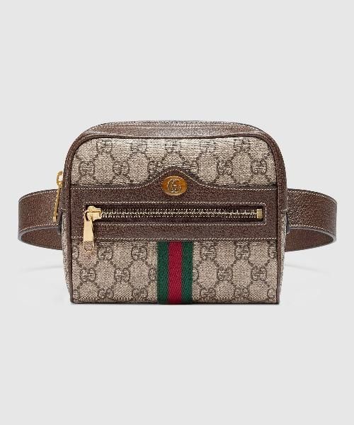 Description First new in the 1970s, the GG logo was an evolution of the original Gucci rhombi design from the 1930s, and from then it’s been an established symbol of Gucci’s heritage. The belt bag combines the signature motif with the Web stripe—a timeless pairing that pays homage to Gucci’s roots. Size: 7″W x 5″H x 2.5″D / W18cm x H13cm x D6cm 100% genuine materials, matching the quality of the Gucci product; Beige/ebony GG Supreme canvas, a material with low environmental impact, with brown leather trim Green and red Web Gold-toned hardware Oval enamel detail with metal Double G Front zipper pocket Interior zipper pocket Adjustable belt closure Top zipper closure Small size Microfiber lining with a suede-like finish Can be as a belt bag on the hip or waist, or as a cross body bag. Sizing Small Belt Bag, Rhombus Design, Gucci Gifts, Small Belt, Canvas Belt, Leather Belt Bag, Gucci Gucci, Gucci Handbags, Designer Backpacks