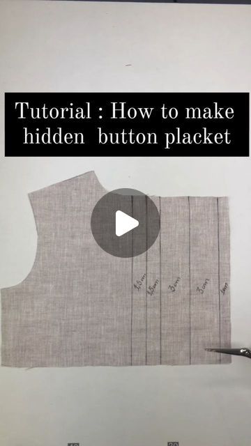 a video demonstrating how to make hidden buttons on a piece of fabric