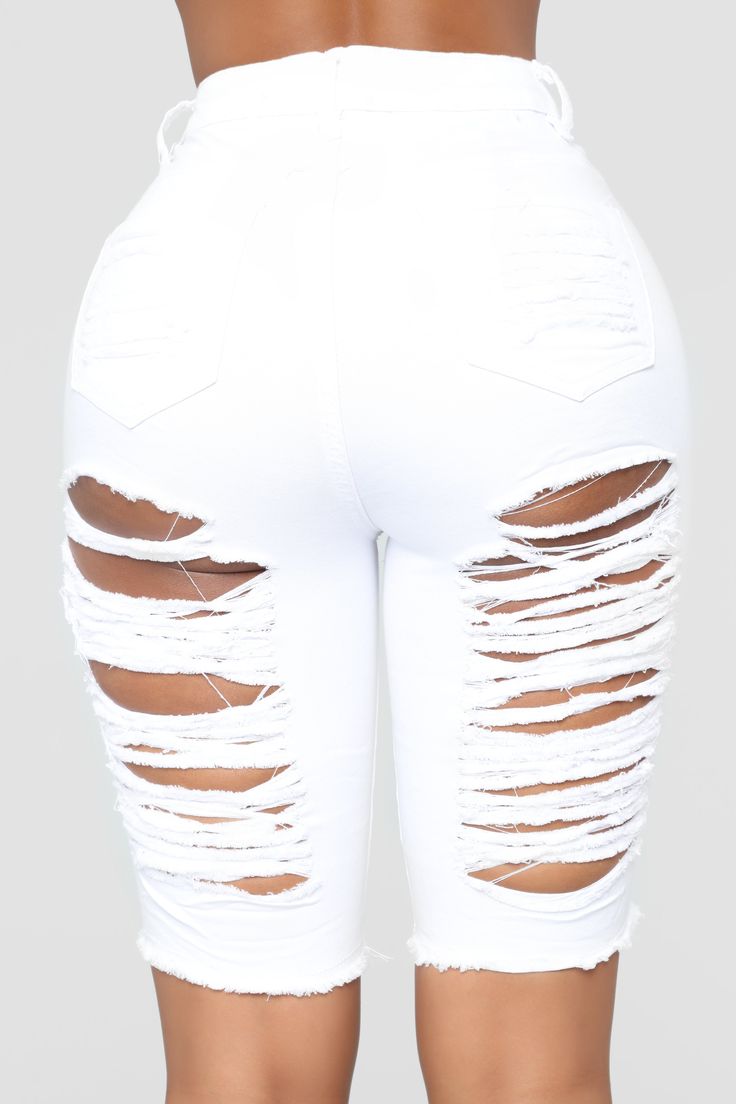 Available In Medium Blue Wash. Black. Camo. And White Stretch Denim High Rise Bermuda Distressed 10.25 Rise 10" Inseam Disclaimer: Due To The Specialized Wash & Distressing Process. Each Garment Is Unique. 97% Cotton 3% Spandex Imported Fitted Distressed White Bottoms, White Distressed Denim Pants, Stretch Distressed White Bottoms, White Ripped Denim Pants, White Ripped Mid-rise Bottoms, White Distressed Bottoms For Streetwear, Stretch Cotton Ripped Bottoms, Ripped Stretch Cotton Bottoms, White Distressed High Waist Bottoms