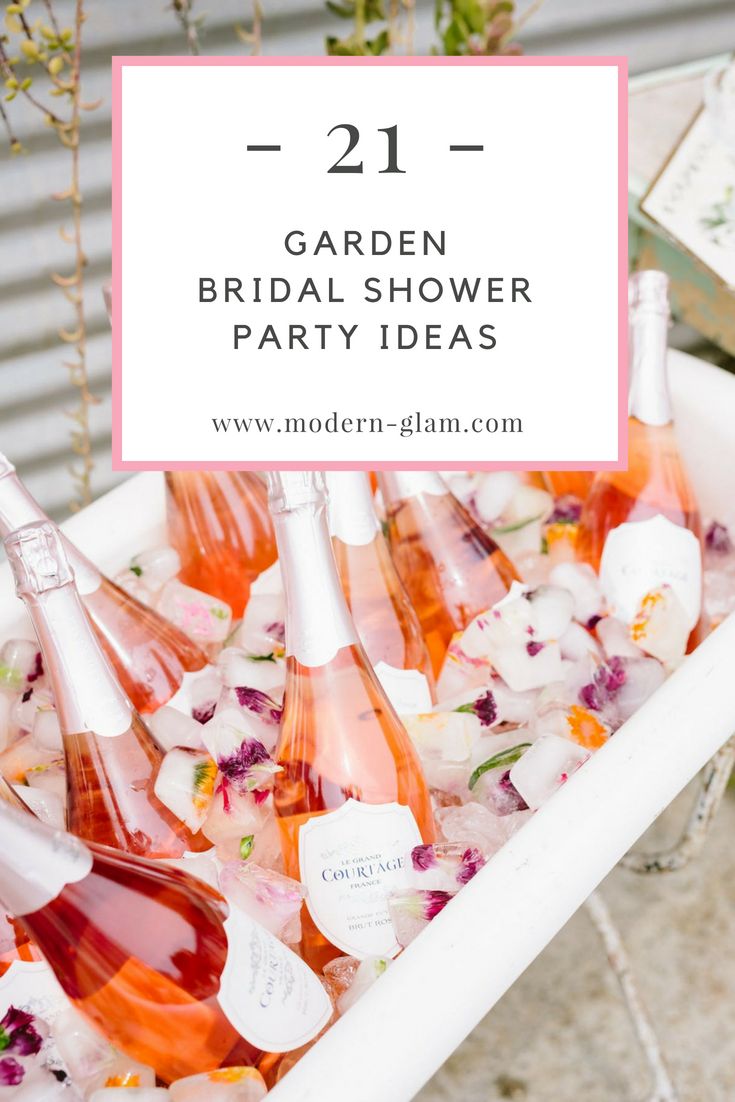 a white tub filled with lots of pink flowers next to a sign that says 21 garden bridal shower party ideas