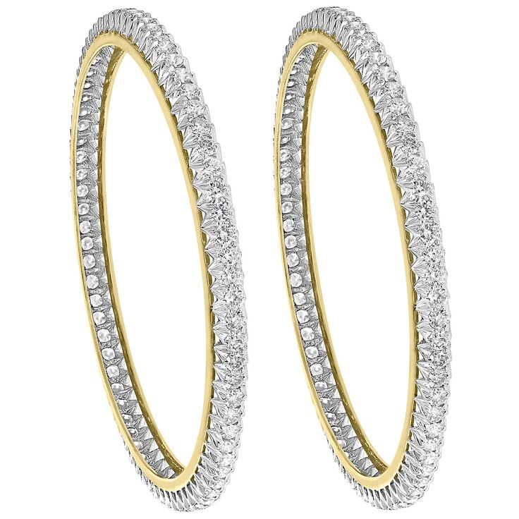 Single line 11.25 Ct Contemporary 18 K Yellow Gold & Diamond Eternity Bangle Pair It features Two bangles crafted from 18k Yellow gold embedded with 11.25 Carats of Round brilliant diamonds in two bangles . These are slide on bangles. Our charming bangle bracelet is embellished with fine dazzling diamonds weighing a total of 11.25 ct. This classic eternity bangle is made out of solid 18k yellow gold and weighs 31 grams. The pattern can be stacked with similar style bangles or worn as a stand-alo Single Line Diamond Bangles Indian, Modern Bangle, Bridal Jewellery Inspiration, Diamond Cuff Bracelet, Diamond Bangles, Modern Bracelets, Yellow Gold Bangle, Gold For Sale, Bangles Design