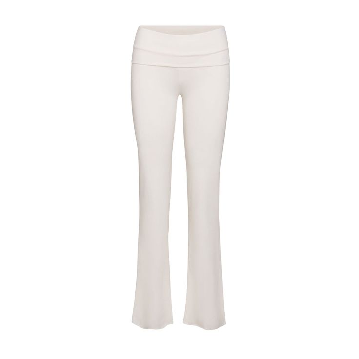 These soft and stretchy Cotton Jersey pants have a ‘00s-inspired foldover waistband with an ultra-feminine ruched detail. Chic Elastane Sweatpants For Loungewear, Wide Leg Elastane Yoga Pants For Loungewear, Wide Leg Relaxed Fit Leggings For Loungewear, Relaxed Fit Wide Leg Leggings For Loungewear, Versatile Wide Leg Leggings For Loungewear, Chic Straight Yoga Pants, Chic Yoga Straight Pants, Mid-rise Elastane Leggings For Loungewear, Chic Yoga Pants With Elastic Waistband