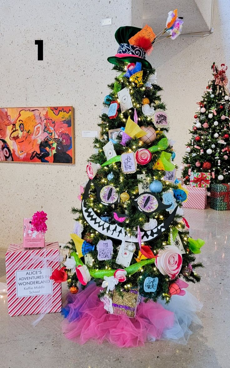 a decorated christmas tree in the middle of a room