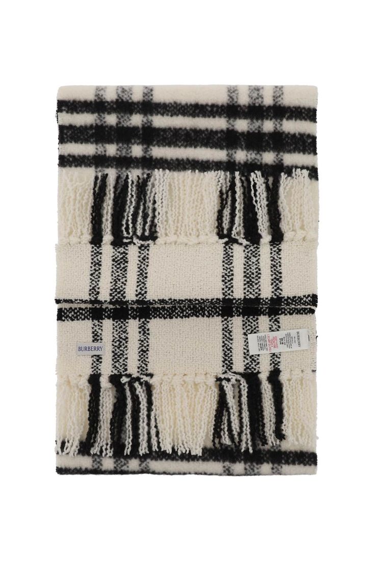 Burberry scarf made of woven and brushed wool for a super-soft finish and decorated with emblematic Check pattern and fringing at the ends. Finished with jacquard Equestrian Knight Design fabric label. Classic British Style, Knight Design, Burberry Scarf, Checked Scarf, Fabric Labels, Heron Preston, Scarf Women, Design Fabric, Wool Scarf