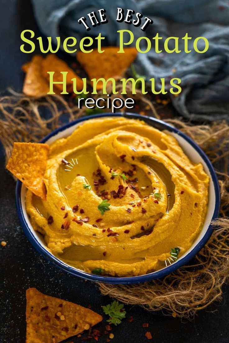 the best sweet potato hummus recipe in a bowl with tortilla chips on the side