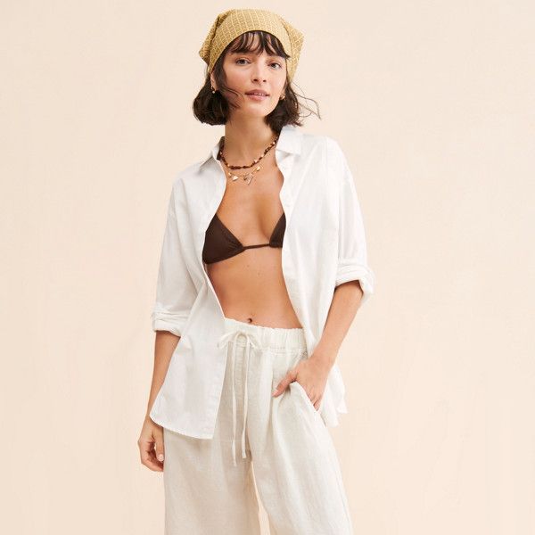 Hannah Linen Pants | Nuuly Rent Neutral Relaxed Fit Bottoms For Vacation, Chic Neutral Pants For Vacation, White Relaxed Fit Bottoms, Effortless White Bottoms For Spring, Effortless White Spring Bottoms, White Relaxed Fit Effortless Bottoms, Effortless Summer Bottoms With Pockets, Neutral Vacation Bottoms With Pockets, Effortless White Summer Bottoms