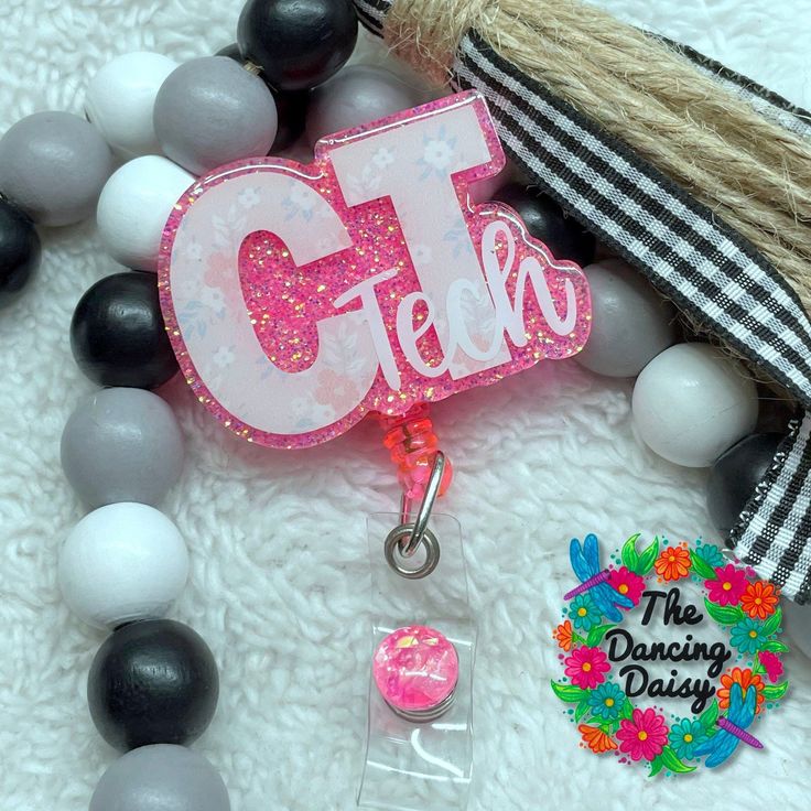 "Created from acrylic, this cute badge reel is perfect for all occupations and sure to make your days a little brighter. When you place your order, add notes of color preferences; custom ideas; etc.  It is YOUR responsibility to let me know if you have color / pattern preferences when ordering. That is why there is a section for personalization. **If there are no instructions /preferences, you will get a \"crafter's choice\" **   Slide clips used by default - alligator clips are by request ONLY Trendy Pink Badge Holders As Gift, Personalized Fun White Badge Reel, Personalized White Fun Badge Reel, Customizable Fun Badge Reel For Gifts, Personalized Fun Badge Reel For Gift, Personalized Fun Badge Reel Gift, Customizable Adjustable Pink Badge Holders, Personalized Fun Badge Reel For Hobby, Personalized Fun Badge Reel For Hobbies