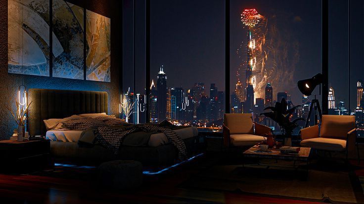 a living room filled with furniture and large windows overlooking the city skyline at night time