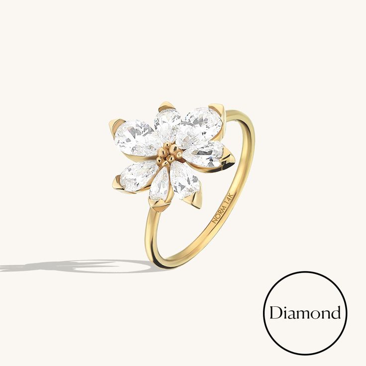 Elevate your style with our exquisite Diamond Flower Cocktail Ring. This captivating piece is a harmonious blend of nature's beauty and fine craftsmanship. Delicately crafted petals, each adorned with a sparkling diamond, come together to form a resplendent flower. The ring exudes a timeless charm that seamlessly transitions from day to evening, making it a stunning addition to your collection and a perfect statement of your individuality. - Made in 14k Solid Gold - Decorated with handset 1.90ct Luxury White Gold Flower Ring For Wedding, Elegant Flower-shaped Diamond Ring For Anniversary, Promise Flower Ring With Rose Cut Diamonds, Promise Rose Cut Diamond Flower Ring, Flower Shaped Promise Ring, Luxury Wedding Flower Ring With Brilliant Cut Diamonds, Elegant Flower-shaped Diamond Cut Rings, Luxury Wedding Flower Ring With Brilliant Cut, Luxury Cubic Zirconia Flower Ring For Wedding