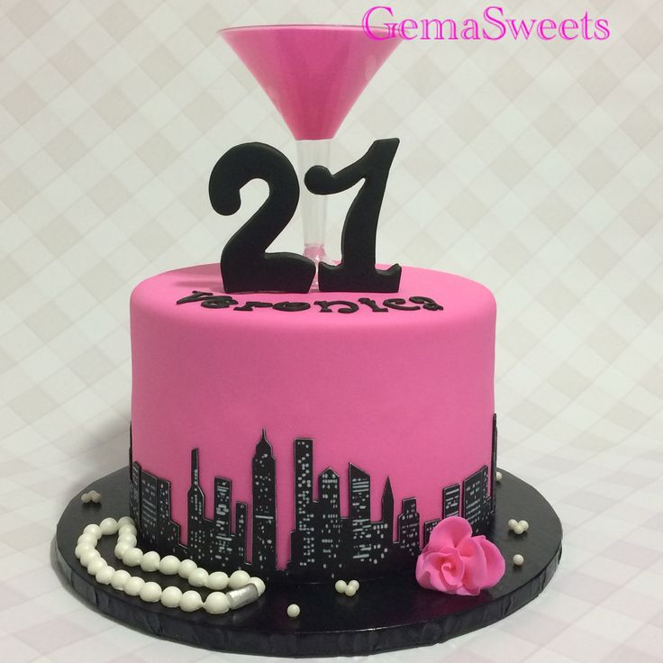 a pink and black 21st birthday cake with the number twenty