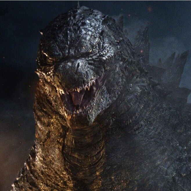 godzilla in the dark with its mouth open