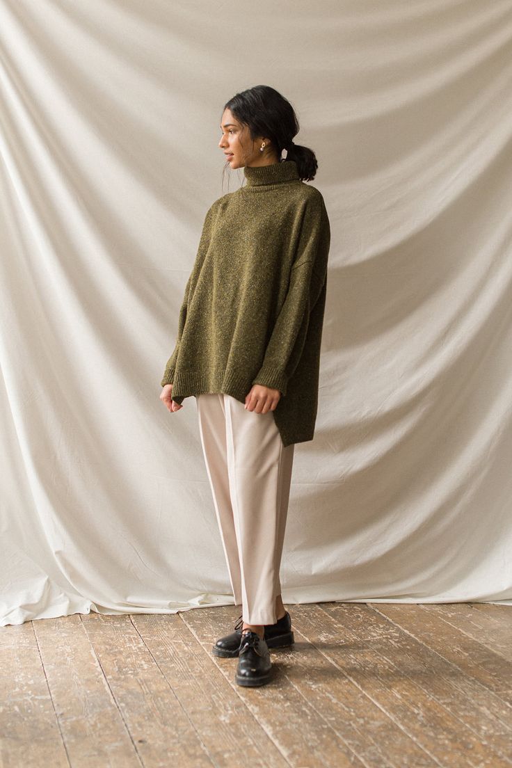 Our classic boucle knit jumper, with a roll neck and made from a 60% wool mix; perfect for layering in the chillier months. Features a flecked detail to the knit, an unbalanced hemline, dropped shoulder sleeves and a small Olive tab stitched to one side of the seam. The boucle is boxy in cut and is made for a relaxed and slouchy fit. Boucle Knit, Cashmere Outfits, Muslim Fashion Hijab, Roll Neck Jumpers, Minimalist Wardrobe, Mood Board Fashion, Cold Weather Outfits, Casual Chic Outfit, Abayas Fashion