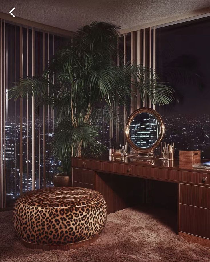 a leopard print ottoman sits in front of a desk with a mirror and palm tree