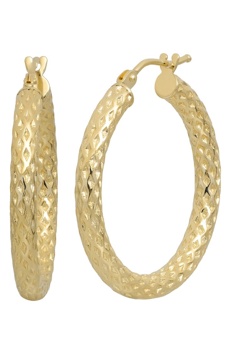 Diamond-shaped facets bounce light off every curve of these handcrafted hoop earrings shaped from 14-karat gold. 1" hoop diameter 14k gold Made in Italy Luxury Hoop Earrings With Ear Wire, Small Hoop Diamond Cut Earrings, Yellow Gold Hoop Jewelry With Diamond Cut, Gold Plated Small Hoop Jewelry With Diamond Cut, Small Hoop Gold Plated Diamond Cut Jewelry, Gold Diamond Cut Hoop Earrings, Fine Jewelry Small Hoop Earrings With Diamond Cut, Small Hoop Earrings In Yellow Gold With Diamond Cut, Gold Hoop Earrings With Diamond Cut