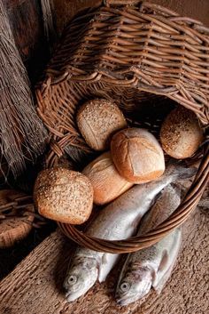 bread and fish in a wicker basket