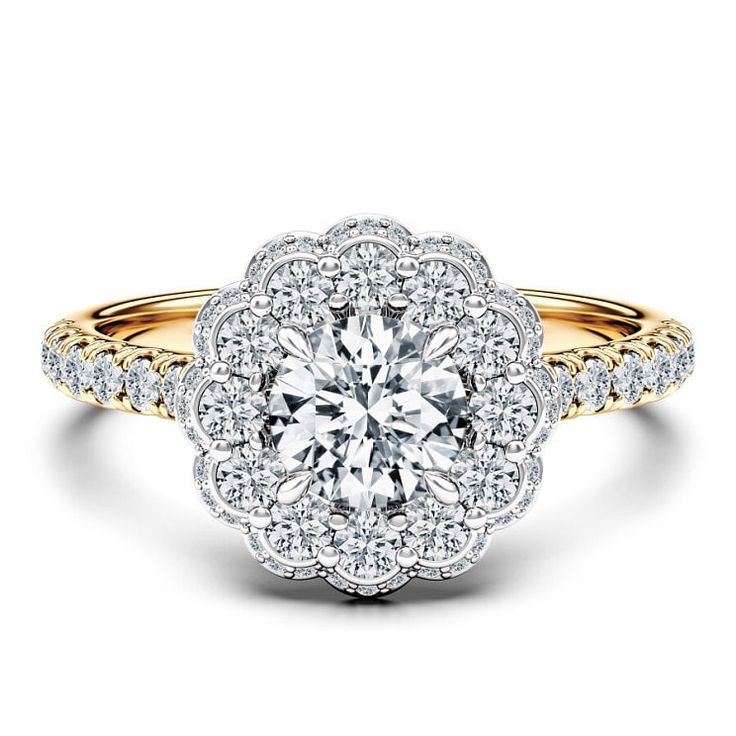 a yellow and white gold engagement ring with an intricate flower design on the center, surrounded by round brilliant diamonds