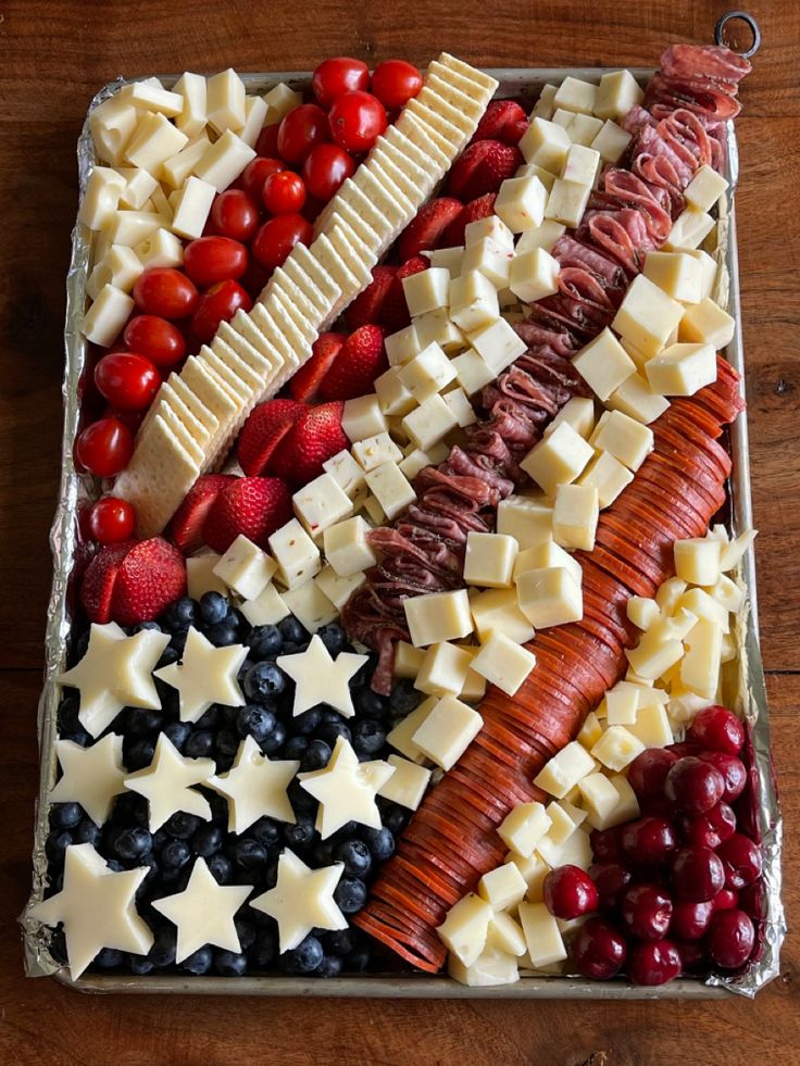 an american flag made out of cheese and fruit