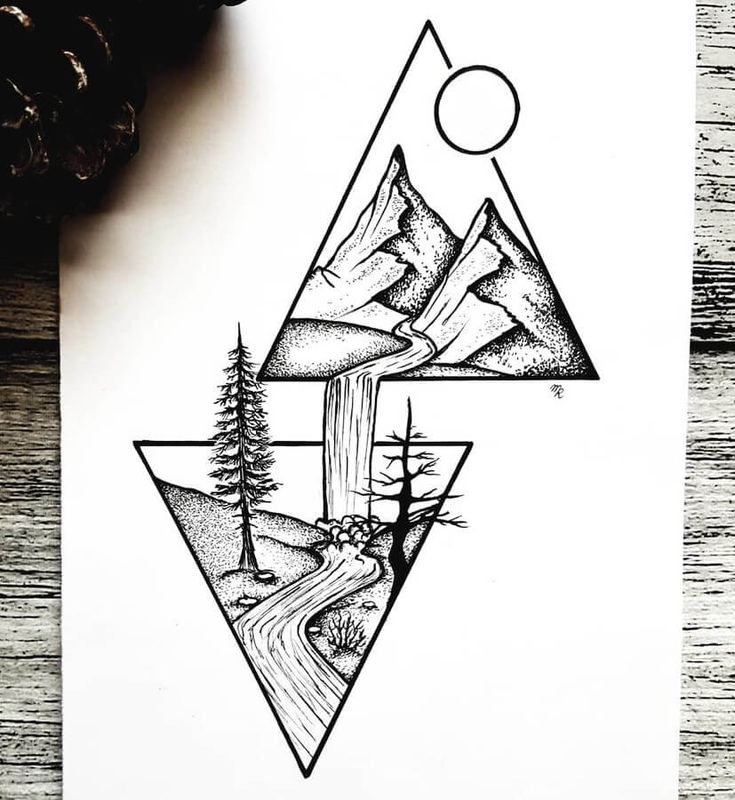 a drawing of mountains and trees in the shape of a triangle on top of a piece of paper