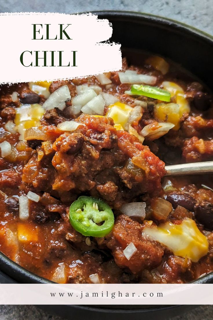 A bowl of elk chili topped with cubed cheese, diced onions, and jalapeños. Elk Meat Chilli, Elk Burger Chili, Ground Elk Chili, Elk Chili Recipe Crockpot, Venison Chili Recipe Crockpot, Hamburger Chili Recipe, Elk Chili Recipe, Ground Elk Recipes, Chilli Recipe Crockpot